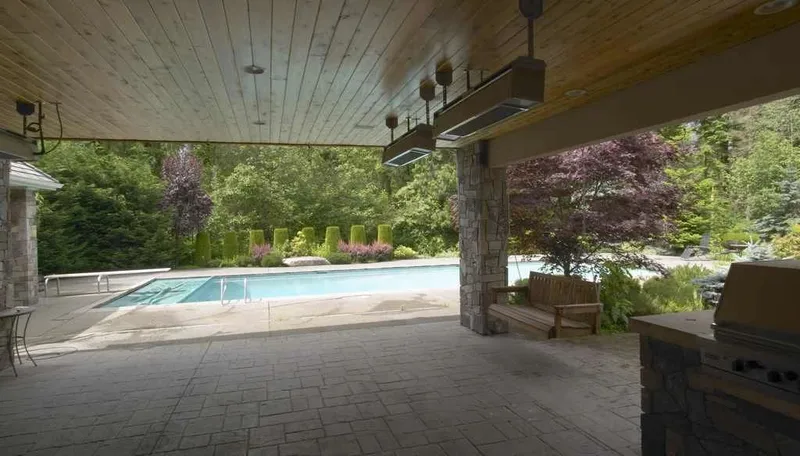 Woodinville, wine room and pool: Covered outdoor living area facing the swimming pool