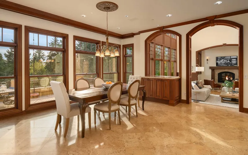 Window-lined dining area beside the living room