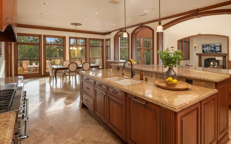 Wood-cabinet kitchen with a large island